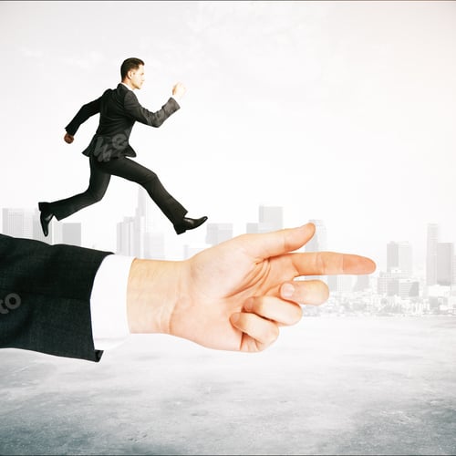 Preview: Guidance Concept With Businessman Running On Abstract Arm Pointing Forward On Foggy City Background