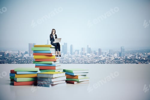 Preview: Businesswoman With Laptop Sitting On Book Pile. City Skyline Background. Future And Vision Concept