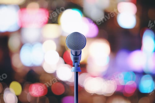 Preview: Silver Microphone On Blurred Lights Background. Art And Performance Concept. 3D Rendering