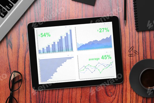 Preview: Digital Tablet Screen With Business Chart And Other Accessories On Wooden Table