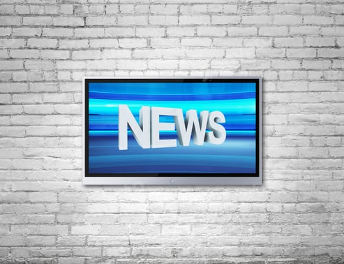 Preview: Wide Screen Tv On Brick Wall With News