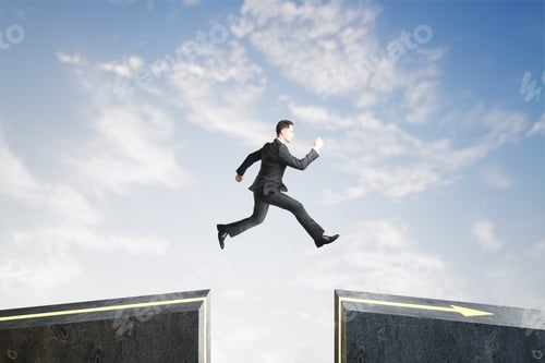 Preview: Side View Of Businessman Jumping Over Gap On Sky Background With Mock Up Lace. Challenge And