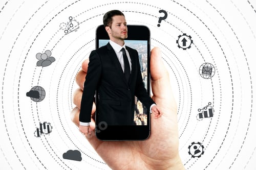 Preview: Abstract Image Of Hand Holding Smartphone With Businessman And Digital Business Network On White