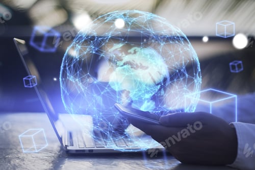 Preview: Close Up Of Businessman Hand Using Laptop Keyboard And Smartphone With Reative Glowing Blue Globe