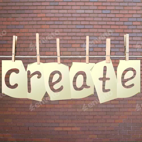 Preview: Paper Cards With Create Hanging On Rope On Brick Wall