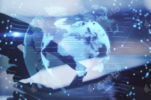 Preview: Close Up Of Hand Pointing At Tablet With Abstract Globe Interface On Blurry Desktop Background