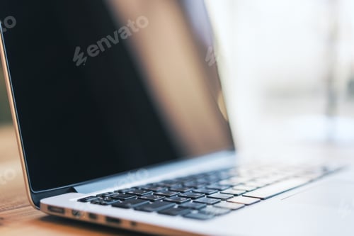 Preview: Side View Of Empty Laptop Computer On Wooden Desktop. Blurry Background. Technology, Programming