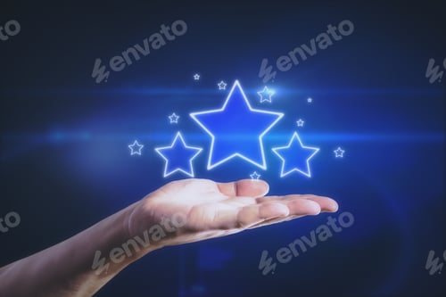 Preview: Hand Holding Bright Stars On Blue Background. Customer Feedback And Ranking Concept