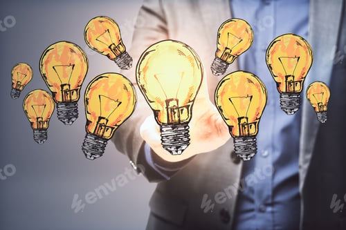 Preview: Businessman Hand Pushing Drawing Yellow Light Bulbs. Success And Startup Concept. Close Up