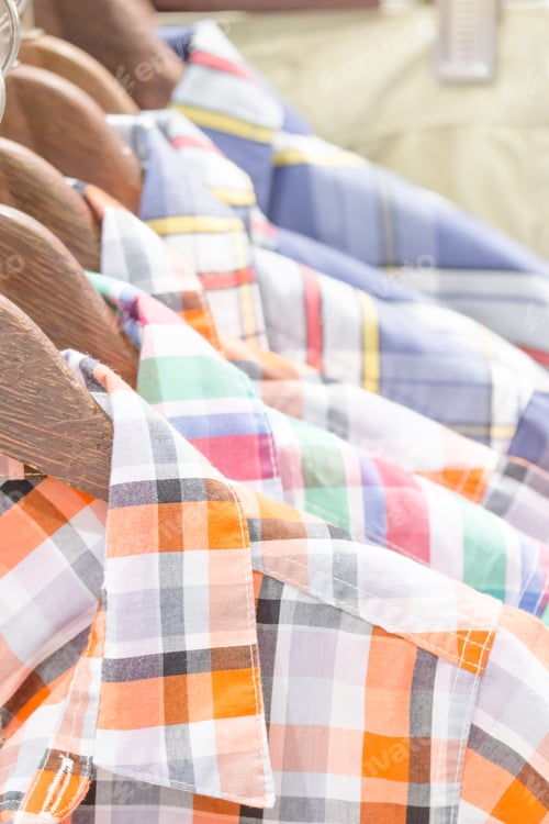 Preview: Close-Up Of Children Clothes Hanging On Hangers.