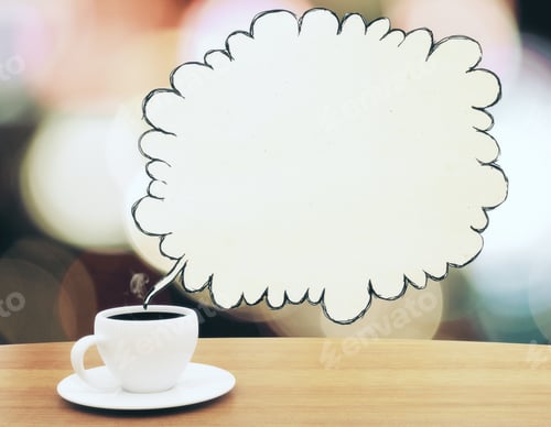 Preview: Cup Of Coffee With Drawn Yellow Speachbubble On Wooden Table