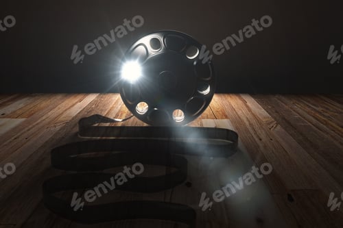 Preview: Old Style Cartridge With Film And Light On Wooden Table