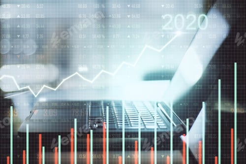 Preview: Laptop On Desktop With Glowing Graph Of Success In 2020 Year. Analytics And Trade Concept.