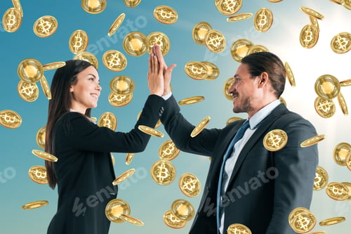 Preview: Businessman And Woman Celebrating Golden Bitcoin Rain On Sky Background. Cryptocurrency And Finance