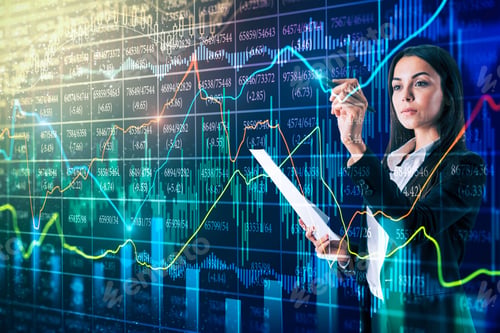Preview: Attractive Businesswoman With Document In Hand Using Creative Forex Chart Interface On Blurry