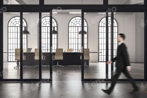 Preview: Businessman Walking In Minimalistic Meeting Room In Loft Interior With Panoramic City View And
