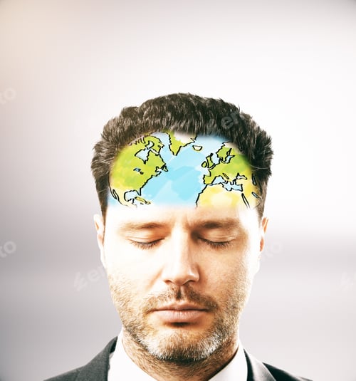 Preview: Portrait Of Pensive Businessman With Map On Forehead. Light Background