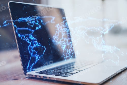 Preview: Close Up Of Laptop With Glowing Blue Map Hologram And Digital Data Concept On Blurry Office Desktop