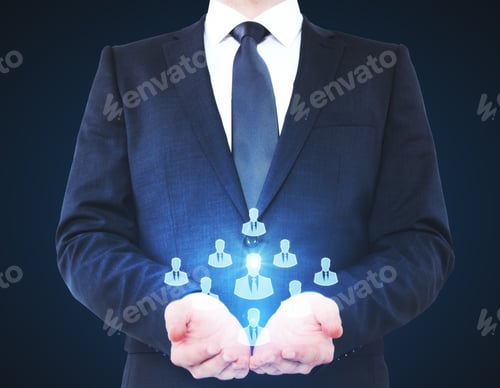 Preview: Businessman Holding Hr Hologram On Dark Background. Recruiting Concept