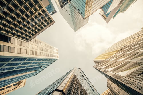 Preview: Bottom View Of Skyscrapers On Bright Blue Sky Background. Urban And Downtown Concept