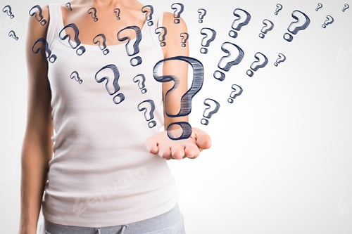 Preview: Casual Woman Holding Drawn Question Marks On White Background. Confusion And Faq Concept