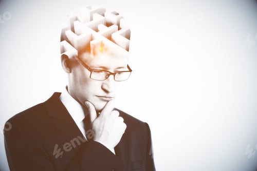Preview: Portrait Of Attractive Young Businessman With Maze Brain On Light Background. Problem Concept