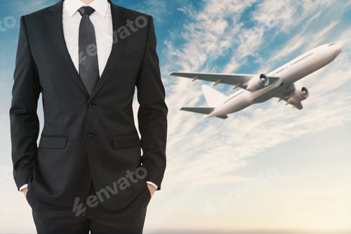 Preview: Businessman In Suit Standing On Sky Background With Flying Airplane. Success And Passenger Concept