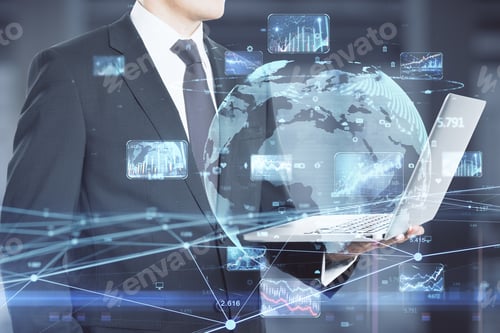 Preview: Close Up Of Businessman Hand Holding Laptop With Creative Glowing Globe Hologram With Forex Charts