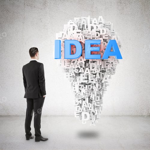 Preview: Businessman In Suit Looking To Idea Symbol