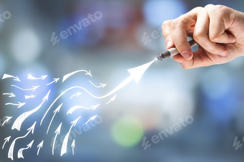 Preview: Man Hand Drawing White Arrows At Abstract Blured Background