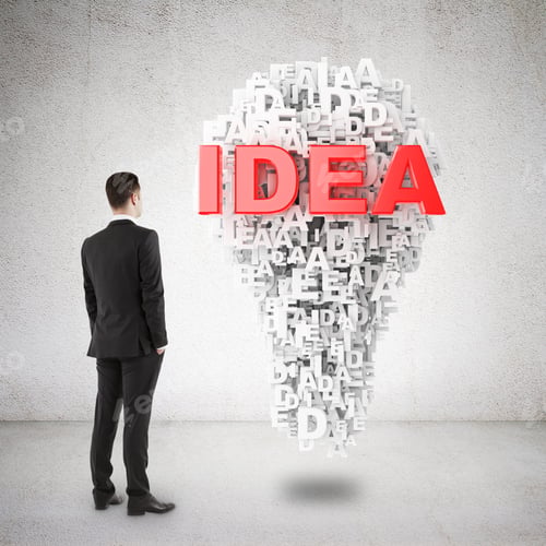 Preview: Businessman In Suit Looking To Big Lamp Symbol