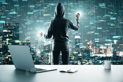 Preview: Back View Of Hacker In Modern Office With Laptop, Coffee Cup And Night City View Using Glowing