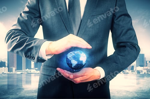 Preview: Businessman In Suit Holding Abstract Digital Terrestrial Globe On City Background. Global Business