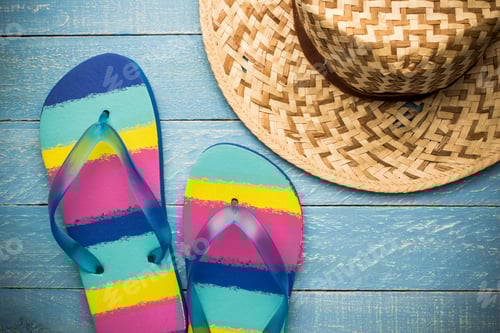 Preview: Colorful Beach Flip Flop And Straw Hat On Wooden Background