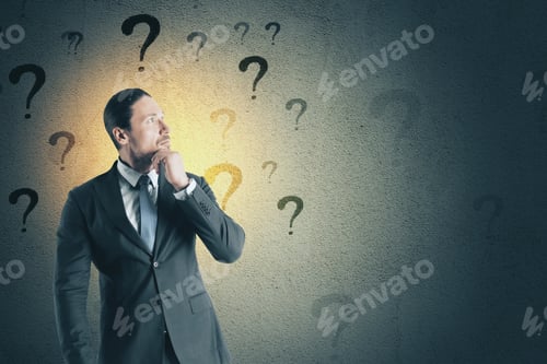 Preview: Businessman Thinking On Concrete Wall Background With Question Marks. Confusion And Choice Concept