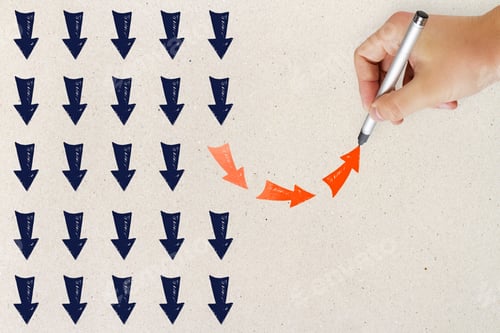 Preview: Unique Solution Concept With Hand Pointing Red Arrows In Flow Of Black Arrows On Light Background