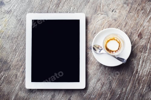 Preview: Blank Digital Tablet And Cup Of Coffee On A Wooden Table