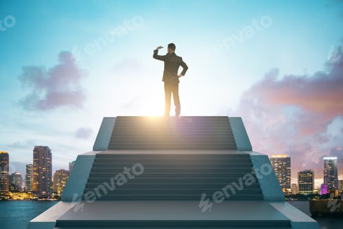 Preview: Back View Of Young European Businessman Standing On Top Of Stairs On Bright City Background With
