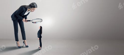 Preview: Female In Suit Using Magnifier Magnifying Glass To Look At Tiny Subordinate On Concrete Background