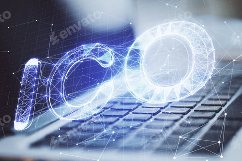 Preview: Laptop With Creative Glowing Polygonal Ico Hologram On Blurry Background. Initial Coin Offering