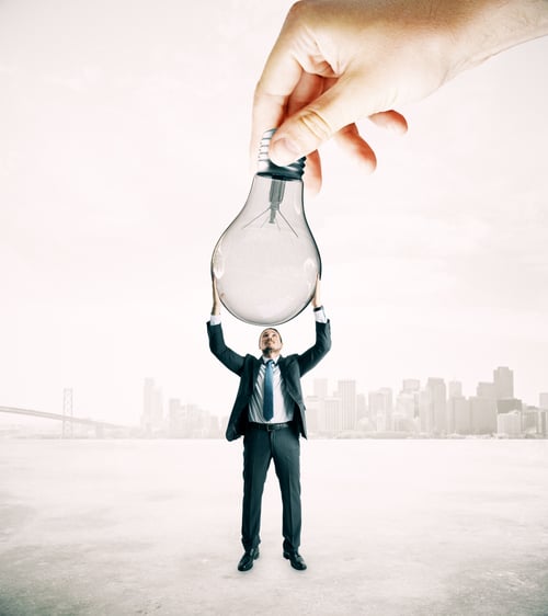 Preview: Hand Handing Lamp To Businessman On Abstract City Background. Idea And Teamwork Concept