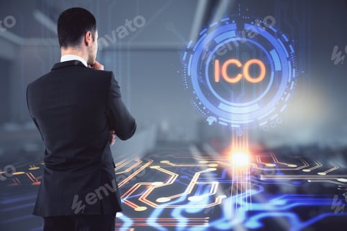 Preview: Attractive Young European Businessman Standing In Blurry Office Interior With Glowing Ico Hologram