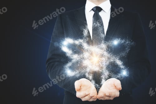 Preview: Businessman Holding Abstract Molecule On Dark Background. Atom Concept