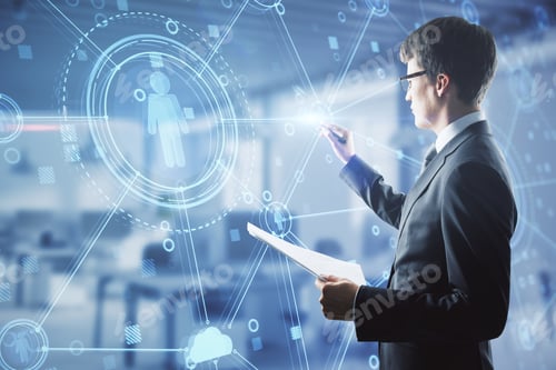 Preview: Businessman Hand In Office Using Creative Glowing Business Interface On Blurry Background. Human