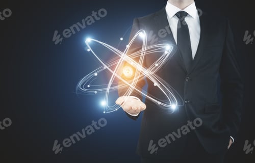 Preview: Unrecognizable Businessman Holding Abstract Glowing Atom. Medical Concept