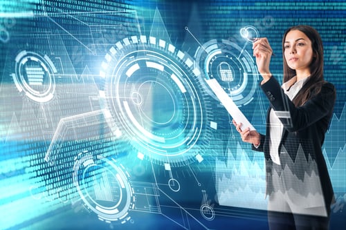 Preview: Attractive Young European Businesswoman With Glowing Business Interface In Blurry Office Interior