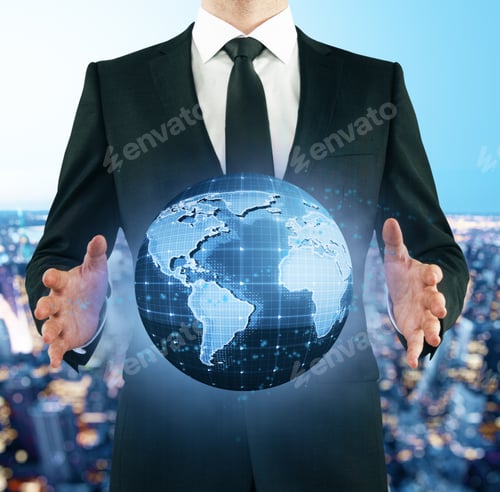 Preview: Businessman In Suit Holding Abstract Digital Terrestrial Globe On City Background. International
