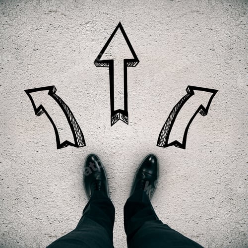 Preview: Man'S Feet On Concrete Background With Drawn Arrows. Different Direction Concept