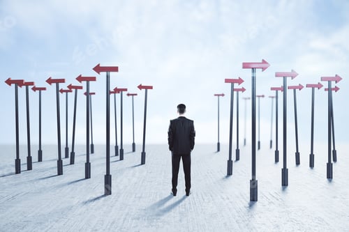 Preview: Businessman Thinks And Red Arrows Pointers Around Him. Business And Challenge Concept.