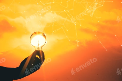 Preview: Hand Holding Light Bulb On Sunset Background. Business Success And Startup Concept.